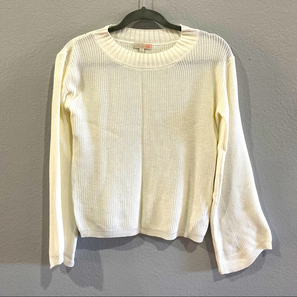 Long sleeve sweater. Brand new condition.